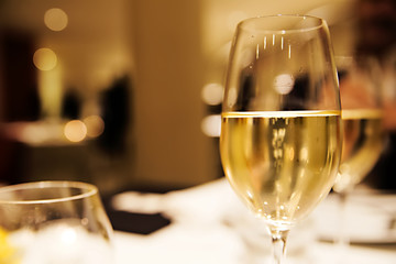 glasses of champagne in golden colors