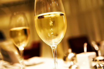 glasses of champagne in golden colors