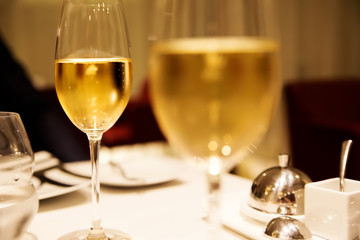 glasses of champagne in golden colors