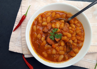 White beans in tomato sauce served in a bowl