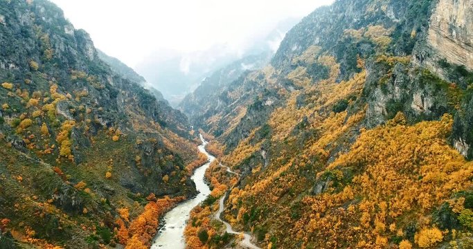 Aerial view of Konitsa stone bridge and Aoos River an autumn day, Greece. National park
