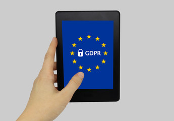 Hand Holding Portable Tablet Displaying "General Data Protection Regulation (GDPR)" EU Flag