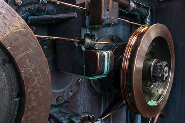 Copper round rollers for rolling wire. Fragment Wire drawing equipment. Abstract industrial background.