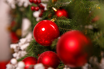 Beautiful Christmas fur-tree decorated with New Year's toys