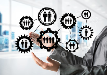 Cogwheels and gears mechanism as social communication concept