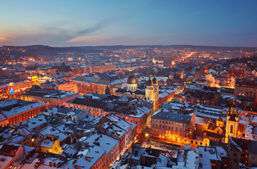 Fototapeta na wymiar Scenic winter night snowy aerial view of the Old Town architecture