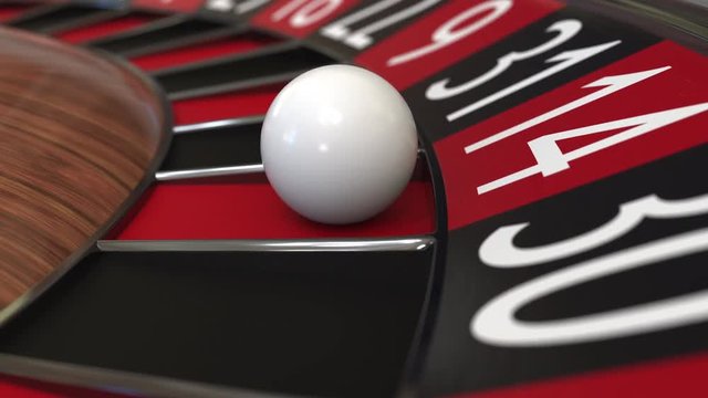 Casino roulette wheel ball hits 14 fourteen red