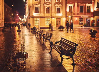 Fototapeta na wymiar city night street paving stone bench