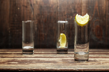 glasses with lemon