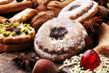 Christmas border. Xmas Gingerbread cookies, spices and decorations on wooden background