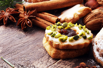 Christmas border. Xmas Gingerbread cookies, spices and decorations on wooden background