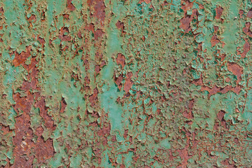 surface of rusty iron with remnants of old paint, grunge metal surface, chipped paint, texture background