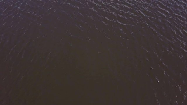Drone view water surface river. Waves on surface river aerial view. Panoramic view water surface river
