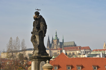 Fototapeta na wymiar Sculpture of St. Anthony on the Charles Bridge in Prague.