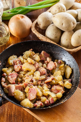 Fried potatoes with onion and bacon