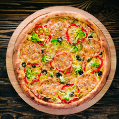 pizza on a cutting board