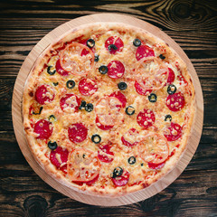 pizza on a cutting board
