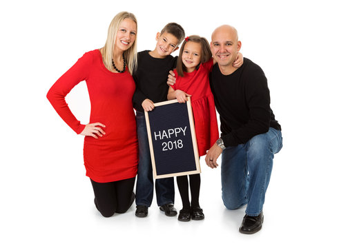 Christmas: Family Celebrates New Year With Happy 2018 Sign