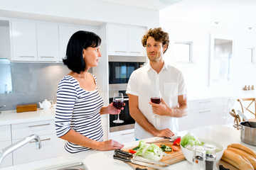 Couple cooking together at home