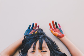 Education , art and creativity learning concept - A black long hair asian student put her colourful...