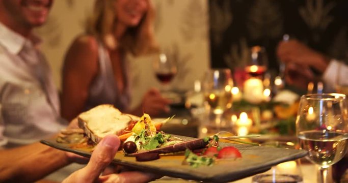 Group of friends having their dinner 