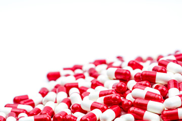Selective focus of antibiotic capsules pills on white background with copy space. Drug resistance concept. Antibiotics drug use with reasonable and global healthcare concept.