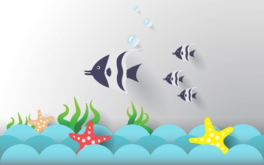 Paper art style.Fish and starfish on the ocean waves.