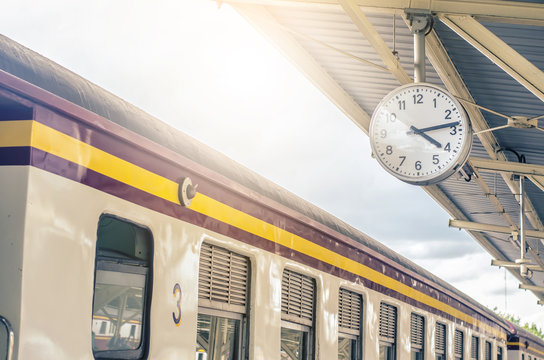 Classic urban analog clock in train station terminal. Concept photo of time, appointment, deadline, meeting, business, travel and schedule..
