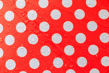 water drop on a waterproof fabric point Red and white beautiful background  with copy space