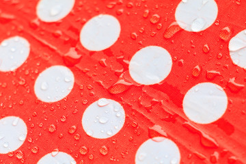 water drop on a waterproof fabric point Red and white beautiful background  with copy space