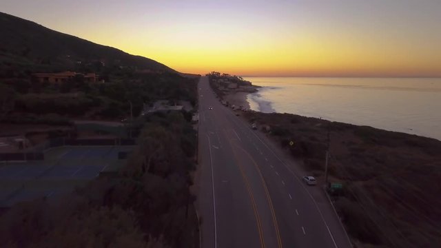 alt pre-sunrise dawn flying south over PCH in Malibu