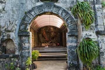 view from Santa Isabel Fort in Taytay with trees and entrance to the old spanish church on the foreground