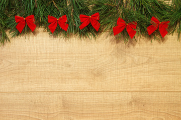 New Year / Christmas tree with red bows on the wooden background template - 182505136
