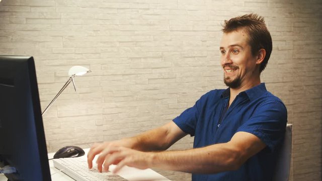 Person going mad while typing on computer 4K