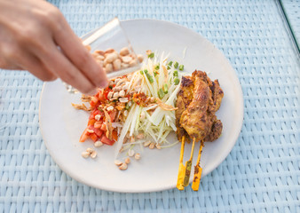 Thai popular food, papaya salad or 