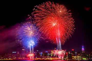 4th of July Macy's on Hudson river and the Empire State NYC