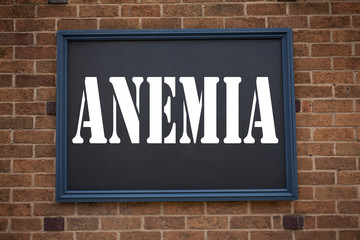 Obraz premium Conceptual hand writing text caption inspiration showing announcement Anemia. Business concept for Medical Diagnosis Iron deficiency aplastic written on frame old brick background with copy space