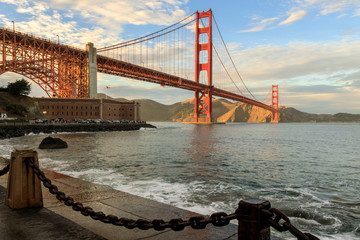 Golden Gate Bridge and Chain Link Fence. Fort Point, San Francisco, California, USA.