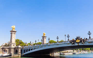 The Alexander III Bridge across the Seine in Paris, France. View from the water
