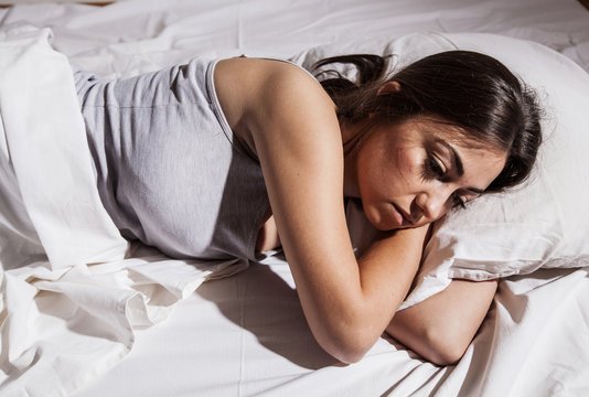 insomnia sleepless depressed woman