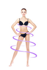 Fit and slender female body. Young and beautiful woman in swimsuit posing isolated on white. Sport, fitness and healthy nutrition concept.