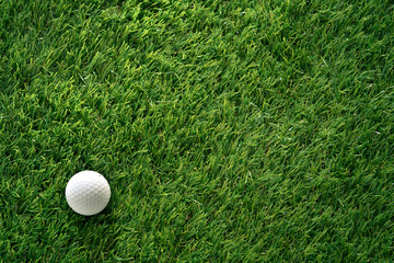 Golf ball on green grass in golf course
