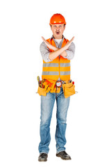 builder in a helmet making stop sign with hand