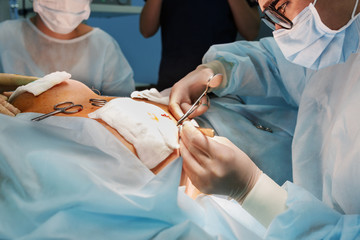 Operation close up. Breast augmentation surger