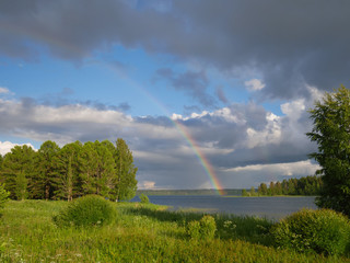 rainbow after rain on a beauty landscape backgrounds