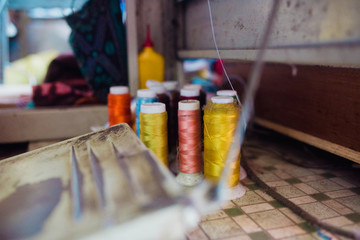 Colorful theads on table