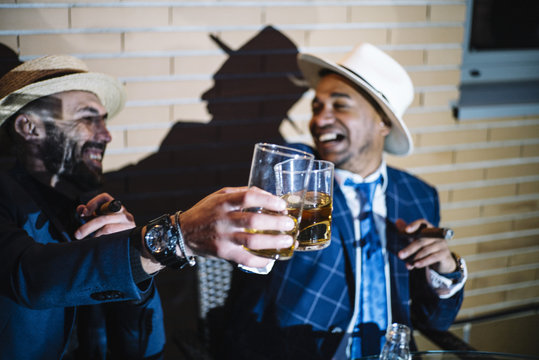 friends drinking alcohol and smoking