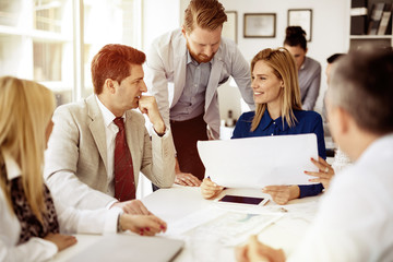 Businesspeople collaborating in office