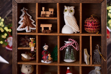 wooden shadow box with christmas decor and toy collection