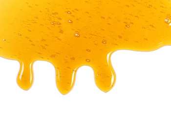 Honey isolated on white background, top view